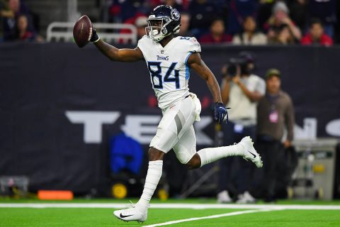 Tennessee Titans wide receiver Corey Davis (84) runs the ball for a touchdown during the third quarter against the Houston Texans at NRG Stadium. (Shanna Lockwood-USA TODAY Sports)