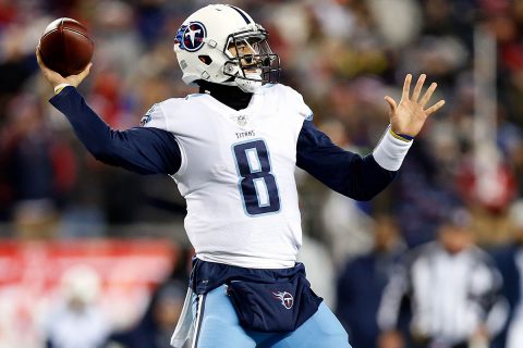 Tennessee Titans quarterback Marcus Mariota (8) looks to throw against the New England Patriots during the second quarter of the AFC Divisional playoff game at Gillette Stadium on January 13th, 2018. (Greg M. Cooper-USA TODAY Sports)