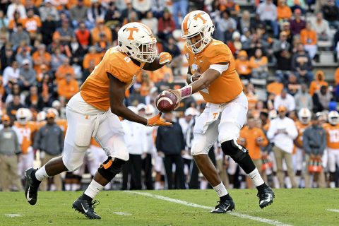 Tennessee Volunteers quarterback Jarrett Guarantano (2) hands the ball off to running back Ty Chandler (8) during the first half against the Charlotte 49ers at Neyland Stadium. (Randy Sartin-USA TODAY Sports)