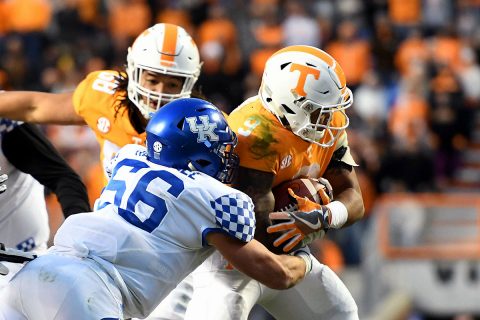 Tennessee Volunteers running back Tim Jordan (9) runs the ball against Kentucky Wildcats linebacker Kash Daniel (56) during the second half at Neyland Stadium. Tennessee won 24 to 7. (Randy Sartin-USA TODAY Sports)