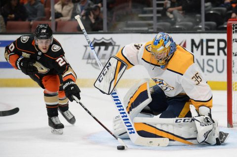 Anaheim Ducks left wing Pontus Aberg (20) moves in for the puck against Nashville Predators goaltender Pekka Rinne (35) during the second period at Honda Center. Mandatory Credit: Gary A. Vasquez-USA TODAY Sports