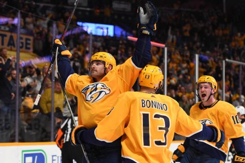 Nashville Predators left wing Austin Watson (51) celebrates with Nashville Predators center Nick Bonino (13) and Nashville Predators center Colton Sissons (10) after a goal during the first period against the Anaheim Ducks at Bridgestone Arena. (Christopher Hanewinckel-USA TODAY Sports)