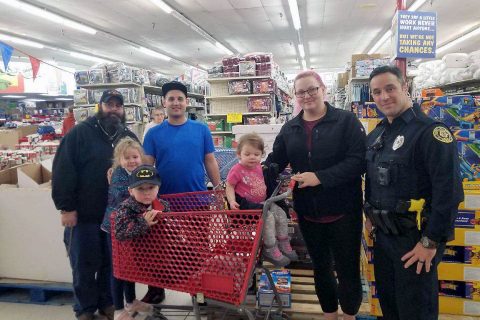 Clarksville Police, Montgomery County Sheriff's Office help Bikers Who Care with their holiday money give-away.