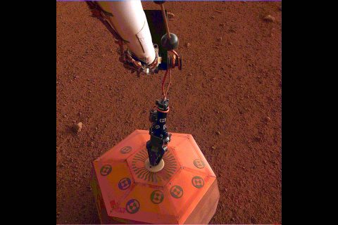 NASA's InSight lander placed its seismometer on Mars on December 19th, 2018. This was the first time a seismometer had ever been placed onto the surface of another planet. (NASA/JPL-Caltech)