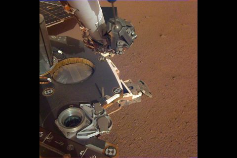 A partial view of the deck of NASA's InSight lander, where it stands on the Martian plains Elysium Planitia. The image was received on Dec. 4, 2018 (Sol 8). (NASA/JPL-Caltech)