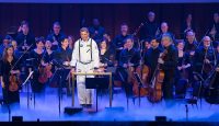 Conductor Emil de Cou speaks after leading the National Symphony Orchestra during the “Space, the Next Frontier” event celebrating NASA’s 60th Anniversary, Friday, June 1, 2018 at the John F. Kennedy Center for the Performing Arts in Washington. The event featured music inspired by space including artists Will.i.am, Grace Potter, Coheed & Cambria, John Cho, and guest Nick Sagan, son of Carl Sagan. (NASA/Aubrey Gemignani)