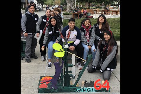 Students from the Los Angeles High School Wild Cats team gather around their invention during the 20th anniversary of the Jet Propulsion Laboratory's Annual Invention Challenge. (NASA/JPL-Caltech)