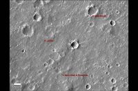 An annotated image of the surface of Mars, taken by the HiRISE camera on NASA’s Mars Reconnaissance Orbiter (MRO) on May 30, 2014. The annotations – added after InSight landed on Nov. 26, 2018 – display the locations of NASA’s InSight lander, its heat shield and parachute. (NASA/JPL-Caltech/University of Arizona)