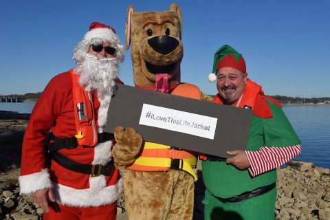 Safety Santa, Bobber the Water Safety Dog, and Hap “Hazard” the Elf film a holiday safety public service announcement Dec. 17, 2018 at J. Percy Priest Lake in Nashville, Tenn., to encourage the public to be vigilant and safe at home this Christmas and when visiting and recreating at Corps of Engineers lakes. (Leon Roberts, USACE)