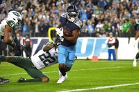 Tennessee Titans wide receiver Corey Davis (84) runs for the game-winning touchdown after a catch during the second half against the New York Jets at Nissan Stadium. (Christopher Hanewinckel-USA TODAY Sports)