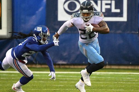 Tennessee Titans running back Derrick Henry (22) runs past New York Giants cornerback Janoris Jenkins (20) during the 2nd quarter at MetLife Stadium. (Robert Deutsch-USA TODAY Sports)