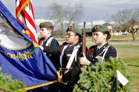 During a Wreaths Across America ceremony Saturday, Dec. 15, 2018, at 101st Airborne Division (Air Assault) Headquarters, Fort Campbell, Kentucky, the colors were presented by the Northwest High School, Clarksville, Tennessee, JROTC color guard – Devon Brooks, freshman (left); Makaya Lane, sophomore; and Taylor Rel, sophomore. Not pictured is Serena Henderson, senior. (Mari-Alice Jasper, Fort Campbell Courier)