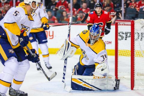  Nashville Predators goaltender Juuse Saros (74) makes a save against the Calgary Flames during the first period at Scotiabank Saddledome. (Sergei Belski-USA TODAY Sports)