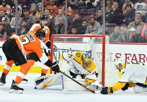 Nashville Predators goaltender Pekka Rinne (35) and left wing Austin Watson (51) battle for the puck against Philadelphia Flyers right wing Wayne Simmonds (17) during the second period at Wells Fargo Center. (Eric Hartline-USA TODAY Sports)