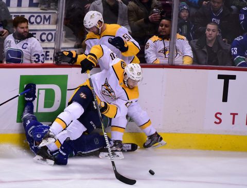 Nashville Predators forward Austin Watson (51) and forward Miikka Salomaki (20) defend against Vancouver Canucks defenseman Troy Stecher (51) during the first period at Rogers Arena. (Anne-Marie Sorvin-USA TODAY Sports)