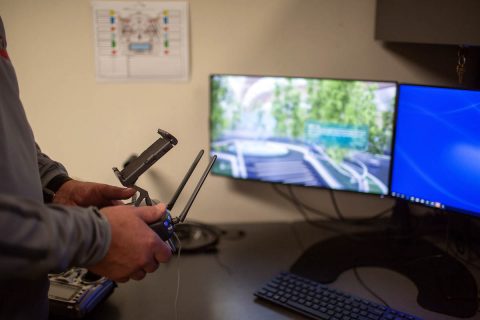Doug Catellier, Austin Peay State University GIS Center project manager, maneuvers a drone on one of the simulators. Doug Catellier, Austin Peay State University GIS Center project manager, maneuvers a drone on one of the simulators.