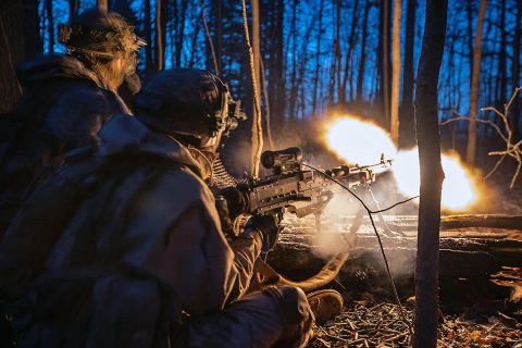 An infantryman from 1st Battalion, 187th Infantry Regiment, 3rd Brigade Combat Team, 101st Airborne Division (Air Assault) provides cover fire with the M240B at Muscatatuck Urban Training Center at Camp Atterbury, Indiana on Dec. 7, 2018. This machine gun fire helped initiate one of the final days of the BCT training exercise which spanned Tennessee, Kentucky and two time zones. (Sgt. Patrick Kirby, 40th Public Affairs Detachment)