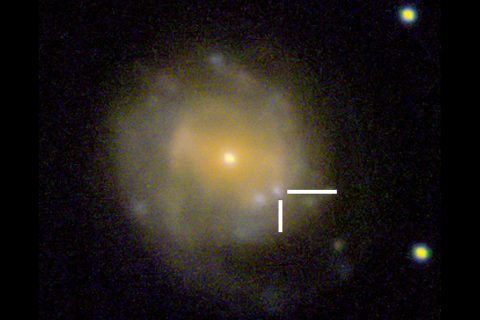 AT2018cow erupted in or near a galaxy known as CGCG 137-068, which is located about 200 million light-years away in the constellation Hercules. This zoomed-in image shows the location of the "Cow" in the galaxy. (Sloan Digital Sky Survey)