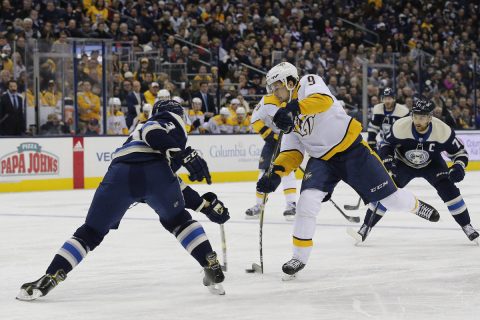  Nashville Predators center Filip Forsberg (9) wrists a shot over the stick of Columbus Blue Jackets defenseman Seth Jones (3) during the first period at Nationwide Arena. (Russell LaBounty-USA TODAY Sports)