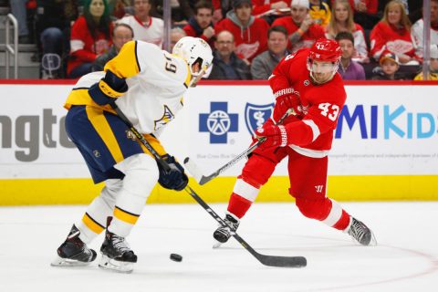  Detroit Red Wings left wing Darren Helm (43) takes a shot defended by Nashville Predators defenseman Roman Josi (59) in the second period at Little Caesars Arena. (Rick Osentoski-USA TODAY Sports)