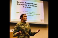 Lt. Col. Rebecca Farrell, a special prosecutor assigned to Fort Campbell’s Office of the Staff Judge Advocate makes opening remarks for a three-day summit on sexual assault and domestic violence. Officials from Blanchfield, Fort Campbell and the local community participated in the summit Feb. 6 to 8 to examine processes and protocols used when responding to reports of sexual assault and domestic violence. (U.S. Army photo by Maria Yager)