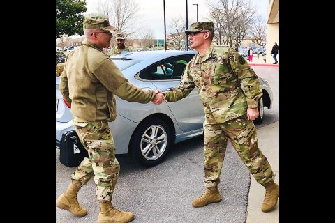 Hospital Commander, Col. Anthony McQueen welcomes Defense Health Agency's Transitional Intermediate Management Organization Director, Maj. Gen. Ronald Place to BACH. Place came to speak with McQueen and hospital staff about BACH's transition from Army Medicine to DHA. (U.S. Army Photo by Laura Boyd.)