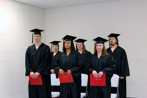 Audrey Clevenger, Kymber Green, Paul Murphy, Rachel Parson, Tabitha Kirk, and Andy Travis receive their high school equivalency diplomas.