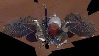 The white east- and west-facing booms – called Temperature and Wind for InSight, or TWINS – on the deck of NASA’s InSight lander belong to its suite of weather sensors. (NASA/JPL-Caltech)