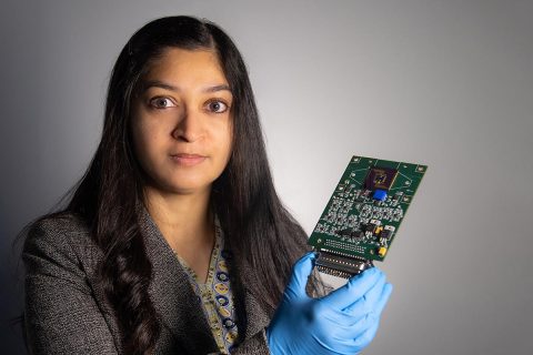 Technologist Mahmooda Sultana holds an early iteration of an autonomous multifunctional sensor platform, which could benefit all of NASA's major scientific disciplines and efforts to send humans to the Moon and Mars. (NASA/W. Hrybyk)