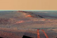 This scene from the panoramic camera on NASA’s Mars Exploration Rover Opportunity looks back toward part of the west rim of Endeavour Crater that the rover drove along, heading southward, during the summer of 2014. (NASA/JPL-Caltech/Cornell/ASU)