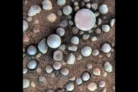 The small spherules on the Martian surface in this close-up image are near Fram Crater, visited by NASA’s Mars Exploration Rover Opportunity during April 2004. (NASA/JPL-Caltech/Cornell/USGS)