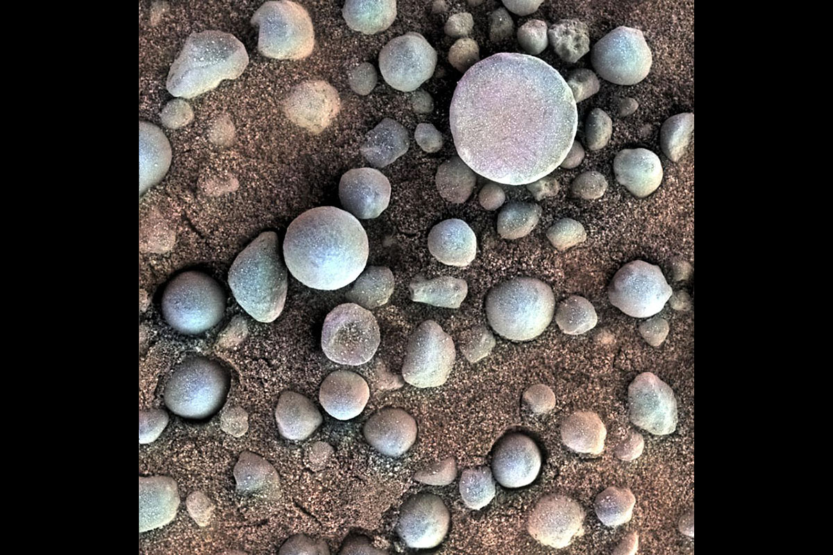 The small spherules on the Martian surface in this close-up image are near Fram Crater, visited by NASA's Mars Exploration Rover Opportunity during April 2004. (NASA/JPL-Caltech/Cornell/USGS)