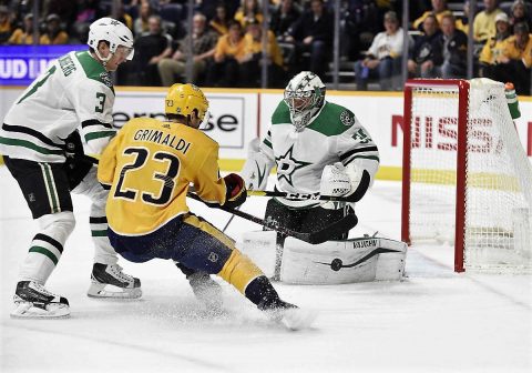 Dallas Stars goaltender Anton Khudobin (35) blocks the shot of Nashville Predators center Rocco Grimaldi (23) during the first period at Bridgestone Arena. (Steve Roberts-USA TODAY Sports)