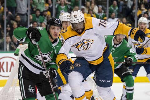 Dallas Stars center Mattias Janmark (13) and Nashville Predators defenseman P.K. Subban (76) chase the puck during the second period at the American Airlines Center. (Jerome Miron-USA TODAY Sports)