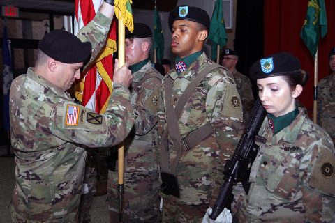 Incoming 502nd Military Police Battalion, Criminal Investigation Command, First Sergeant Nick Brown, returns the guideon at the Change of Command Ceremony, Jan. 4, 2019, at Fort Campbell, KY. The 502nd mission is to conduct felony level criminal investigation with the purpose of seeking truth to support combat readiness, preserve good order and discipline throughout the formation. (U.S. Army photo by Spc. Grant Ligon) 