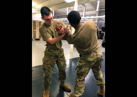 PVT Jared Whiting and PV2 Dorian Rivera, both Military Police Soldiers with the 194th Military Police Company, 716th Military Police Battalion, practice their mechanical arm holds as an effective way to subdue a non-compliant subject. (Sgt. 1st Class Ashley Savage, 16th Military Police Brigade)