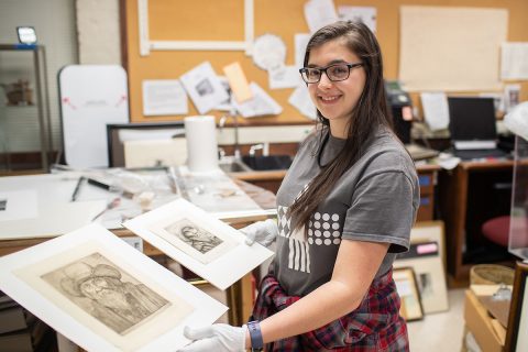 Austin Peay State University junior Katherine Tolleson holds “Head of an Old Man,” left, and “The Sailor.” (APSU)