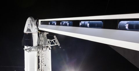 At NASA Kennedy Space Center’s Launch Complex 39A, the crew access arm has been extended to the SpaceX Crew Dragon spacecraft on Jan. 3, 2019. Mounted atop the company’s Falcon 9 rocket, both will undergo checkouts prior to its liftoff for Demo-1, the inaugural flight of one of the spacecraft designed to take NASA astronauts to and from the International Space Station. (SpaceX)