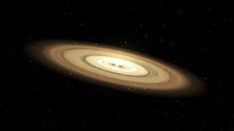 Scientists think planets start off as mere grains of dust. They emerge from giant disks of gas and dust that circle young stars. Gravity and other forces cause material within the disk to collide and coalesce. (illustration) (NASA’s Jet Propulsion Laboratory)