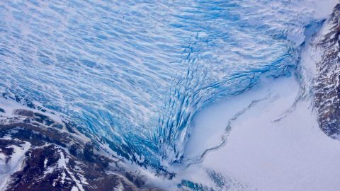 Cracks in the front of a glacier as it reaches the ocean. (NASA/Adam Klein) Cracks in the front of a glacier as it reaches the ocean. (NASA/Adam Klein)