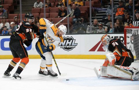 Nashville Predators center Nick Bonino (13) moves in on goal against Anaheim Ducks defenseman Jacob Larsson (32) and goaltender John Gibson (36) during the first period at Honda Center. (Gary A. Vasquez)USA TODAY Sports)