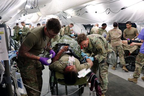 Medical teams are focused as Soldiers from BACH and the 586th Field Hospital respond to simulated casualties during a medical field training exercise on Fort Campbell recently. Medical teams were evaluated on their ability to accurately assess and triage simulated casualties to the appropriate level of care. The results can be used to tailor future training to support unit readiness. (U.S. Army photo by Maria Yager) Medical teams are focused as Soldiers from BACH and the 586th Field Hospital respond to simulated casualties during a medical field training exercise on Fort Campbell recently. Medical teams were evaluated on their ability to accurately assess and triage simulated casualties to the appropriate level of care. The results can be used to tailor future training to support unit readiness. (U.S. Army photo by Maria Yager)