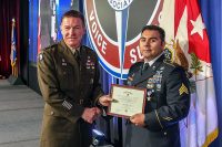 General James McConville, Vice Chief of Staff of the United States Army presents The Silver Star to Sgt. Armando Yanez during a ceremony at the Army Aviation Association of America Summit 2019 in Nashville, Tennessee April 16th, 2019. Yanez, who is assigned to Company C, 6th Battalion, 101st Combat Aviation Brigade, 101st Airborne Division (Air Assault), earned The Silver Star for heroic actions in support of U.S. Army forces in Afghanistan July 12th, 2018. (Sgt. Steven Lopez)