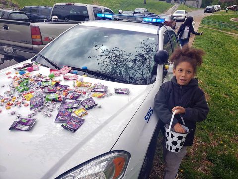 Clarksville Police Officers bring candy and easter eggs to an Easter Egg Hunt at Valley Brook Park.