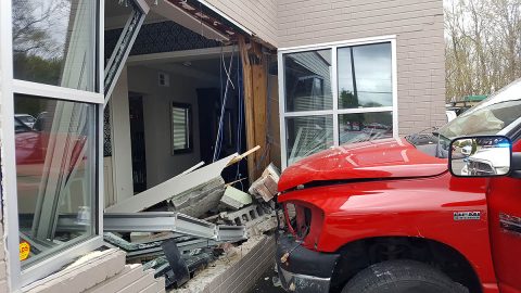 A pickup truck loses control on Madison Street and then crashes into the Edge Salon. (Jim Knoll/Officer Holder, Clarksville Police)