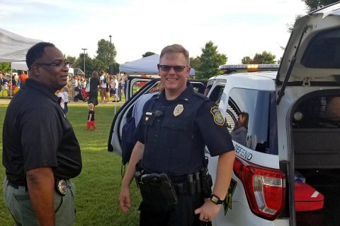 Department of the Army Civilian Police (DACP) Lt. John Schmidt, watch commander, participates in a community event at Werner Park. Senior leaders at the Installation Provost Marshal Office play a large part in planning and supporting events that allow Fort Campbell Police to interact with the public. (Spc. Alexes Anderson, 101st Airborne Division (AA) Sustainment Brigade Public Affairs)