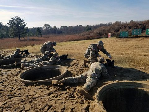 Cadre from Middle Tennessee State University’s Reserve Officer Training Corps program assist cadets with making adjustments on their M4 rifles during the group and zero portion of the M4 qualification range assisted by the 716th Military Police Battalion. (Sgt. 1st Class Carlos Davis, 101st Airborne Division (AA) Sustainment Brigade Public Affairs)