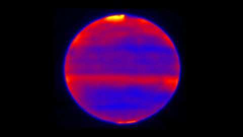 Scientists used red, blue and yellow to infuse this infrared image of Jupiter's atmosphere (red and yellow indicate the hotter regions), which was recorded by the Cooled Mid-Infrared Camera and Spectrograph (COMICS) at the Subaru Telescope on the summit of Mauna Kea, Hawaii on Jan. 12, 2017. (NAOJ and NASA/JPL-Caltech) Scientists used red, blue and yellow to infuse this infrared image of Jupiter's atmosphere (red and yellow indicate the hotter regions), which was recorded by the Cooled Mid-Infrared Camera and Spectrograph (COMICS) at the Subaru Telescope on the summit of Mauna Kea, Hawaii on Jan. 12, 2017. (NAOJ and NASA/JPL-Caltech)