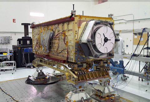 OCO-3 sits on the large vibration table (known as the "shaker") in the Environmental Test Lab at the Jet Propulsion Laboratory. (NASA/JPL-Caltech)