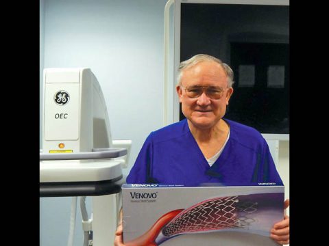 Stephen F. Daugherty, MD of VeinCare Centers of Tennessee holding a BD Venovo stent.